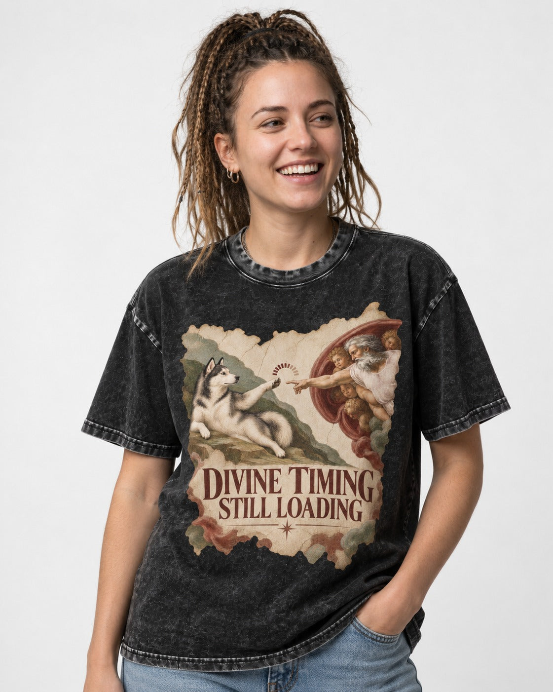 Husky Divine Timing Still Loading Creation Parody Graphic Washed Tee in Black, worn by a model