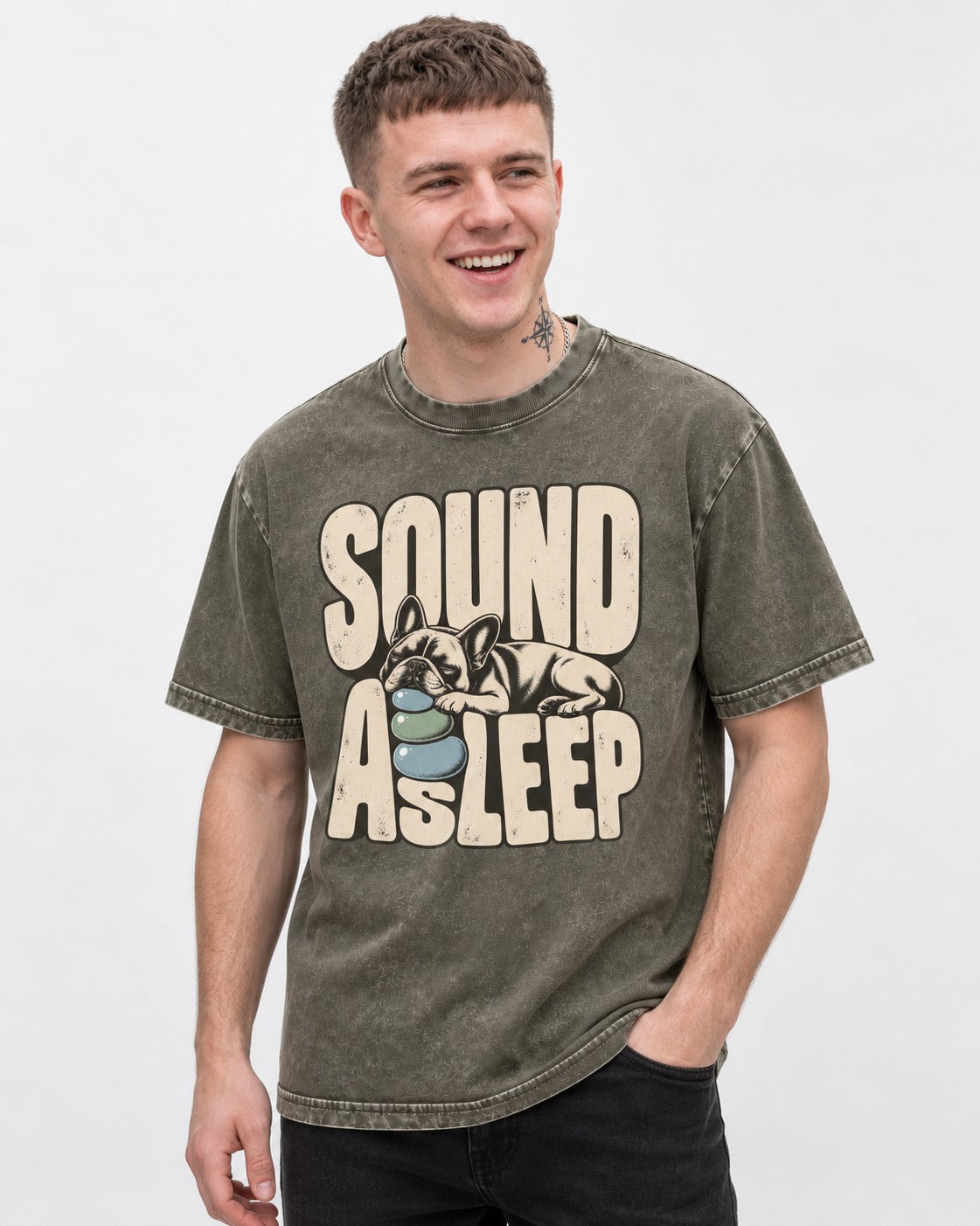 Frenchie Sound Asleep Stone Pillow Graphic Washed Tee in Army Green, worn by a model