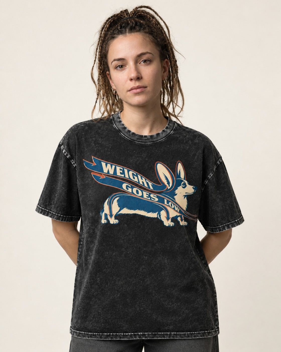 Corgi Weight Goes Low Ribbon Arrow Graphic Washed Tee in Black, worn by a model
