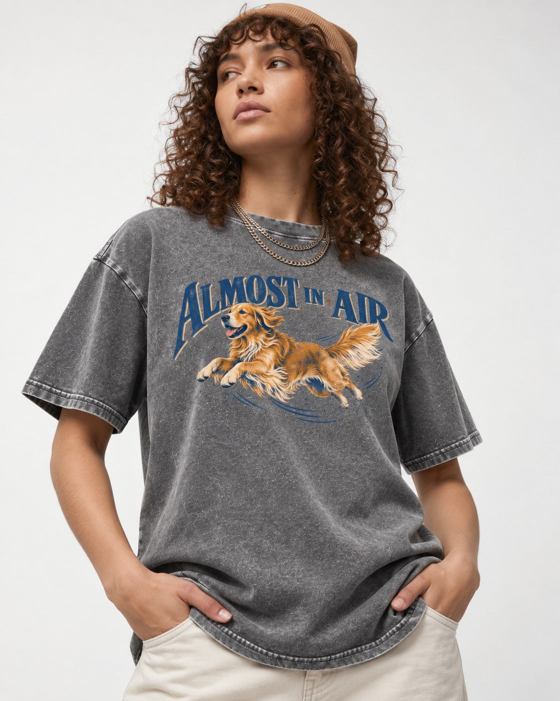 Golden Retriever Almost in Air Flying Graphic Washed Tee in Gray, worn by a model