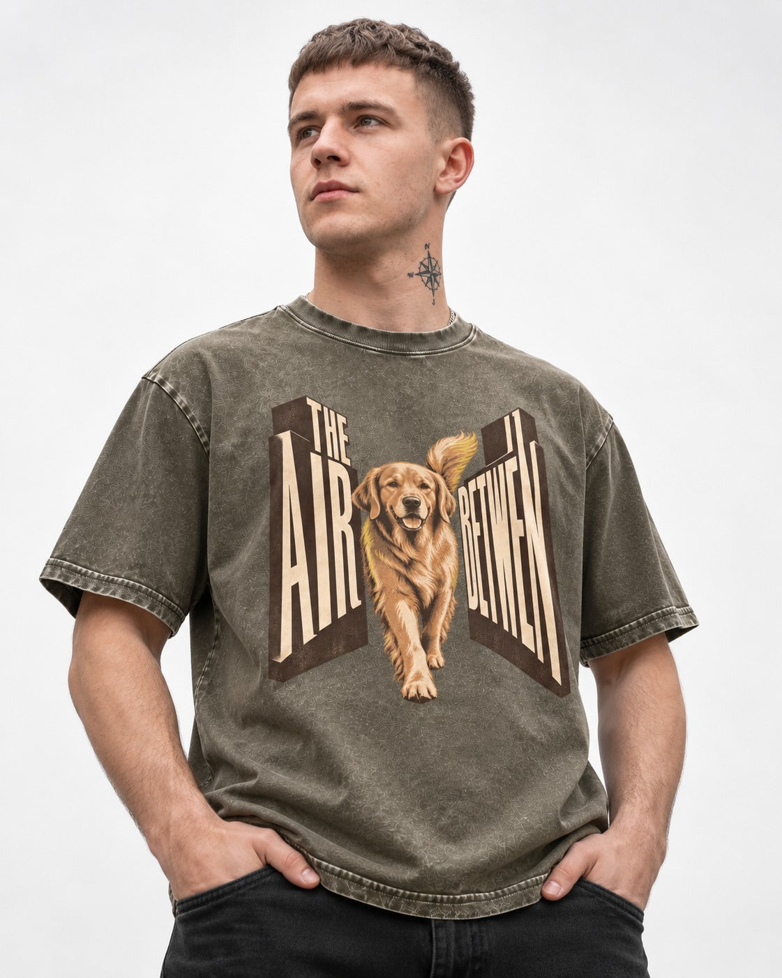 The Air Between Dimensional Golden Retriever Graphic Washed Tee in Army Green, worn by a model