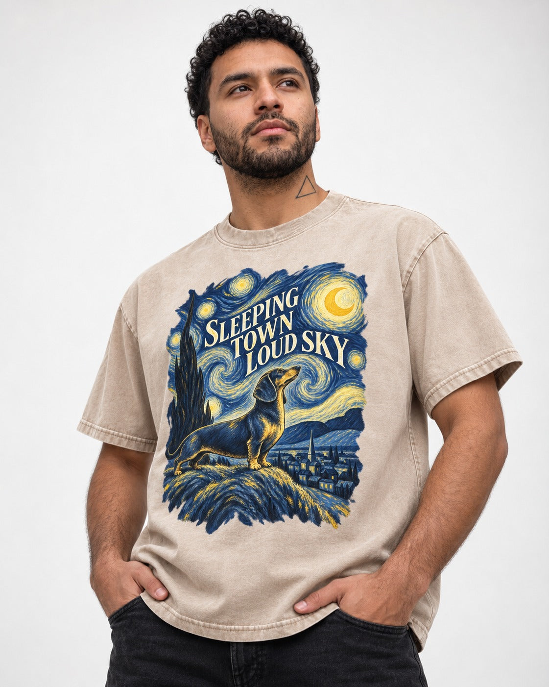 Dachshund Sleeping Town Loud Sky Starry Night Graphic Washed Tee in Apricot, worn by a model