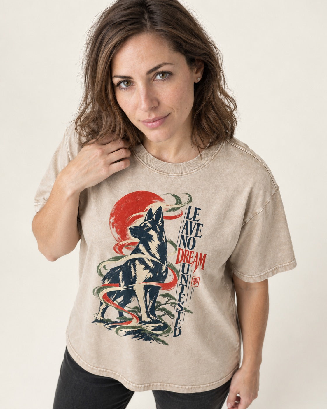 Leave No Dream Untested German Shepherd Dog Washed Tee in Apricot, worn by a model