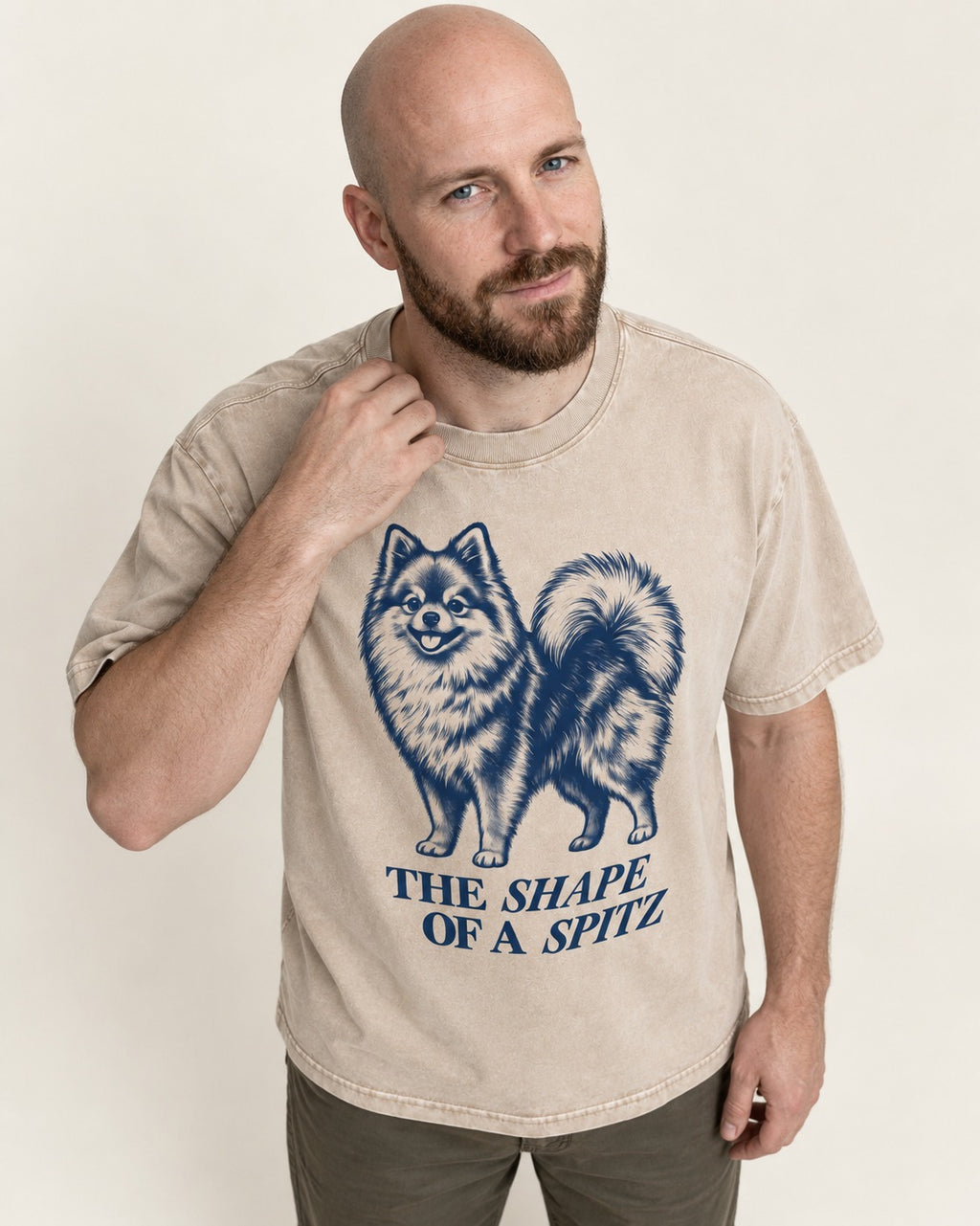 The Shape of a Pomeranian Washed Tee in Apricot, worn by a model