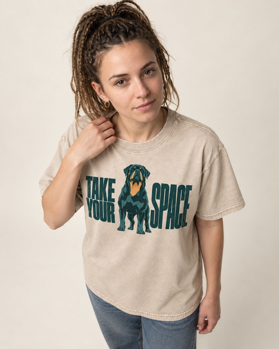 Rottweiler Take Your Space Washed Tee in Apricot, worn by a model