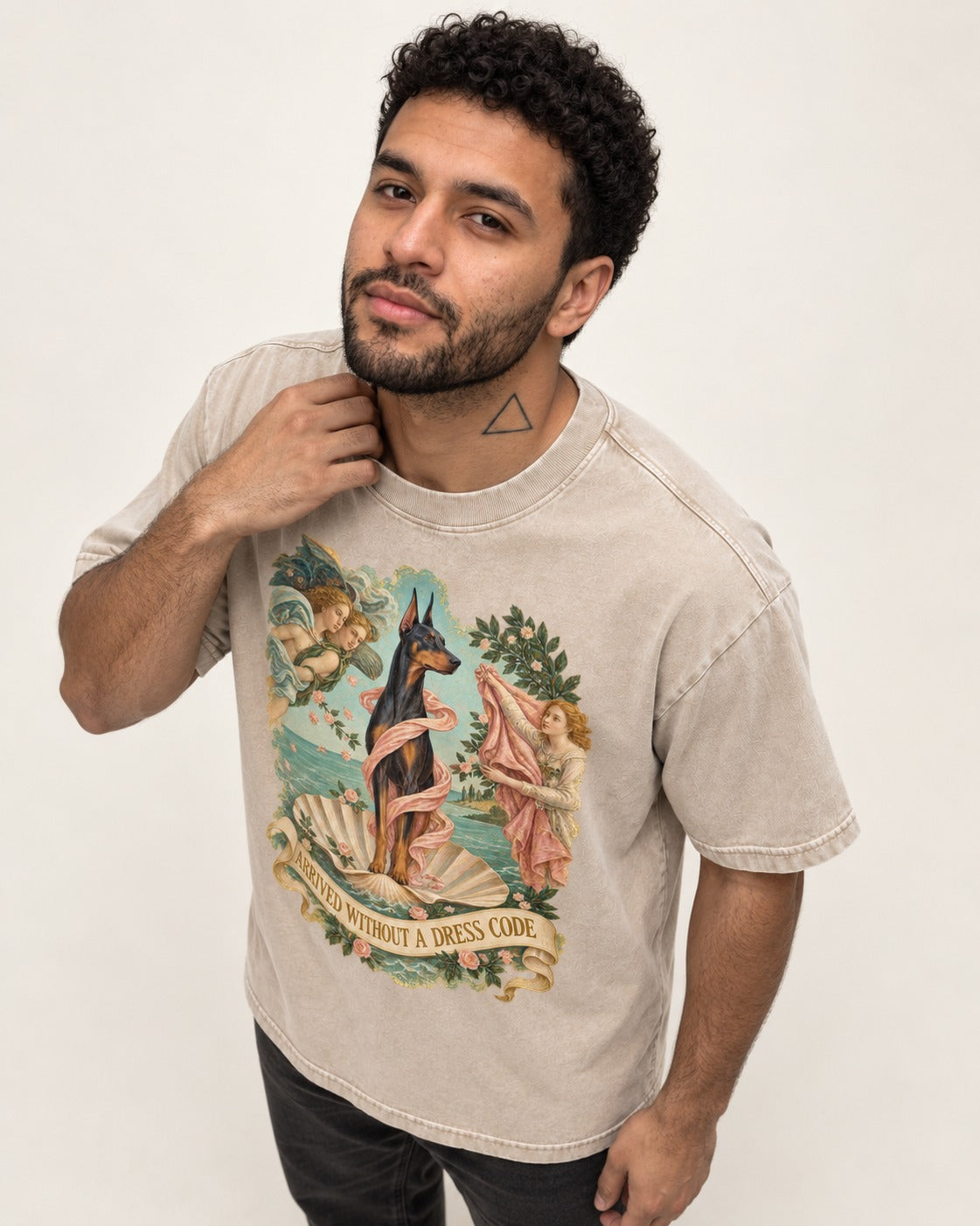 Doberman Arrived Without a Dress Code Renaissance Graphic Washed Tee in Apricot, worn by a model