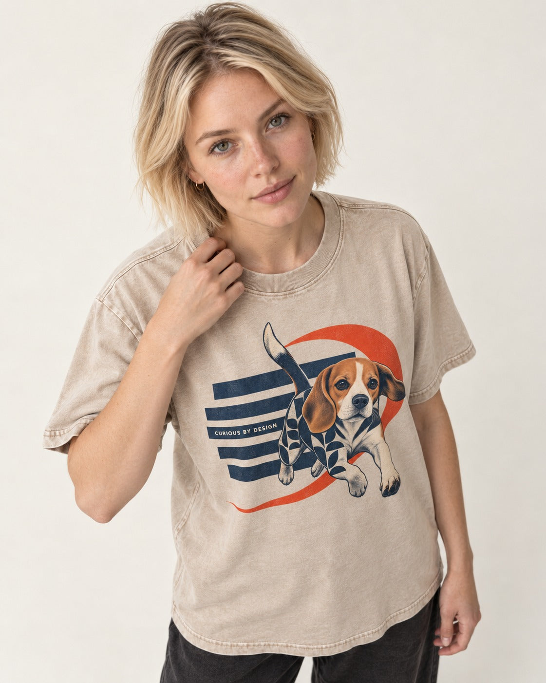 Beagle Born Curious Washed Tee in Apricot, worn by a model