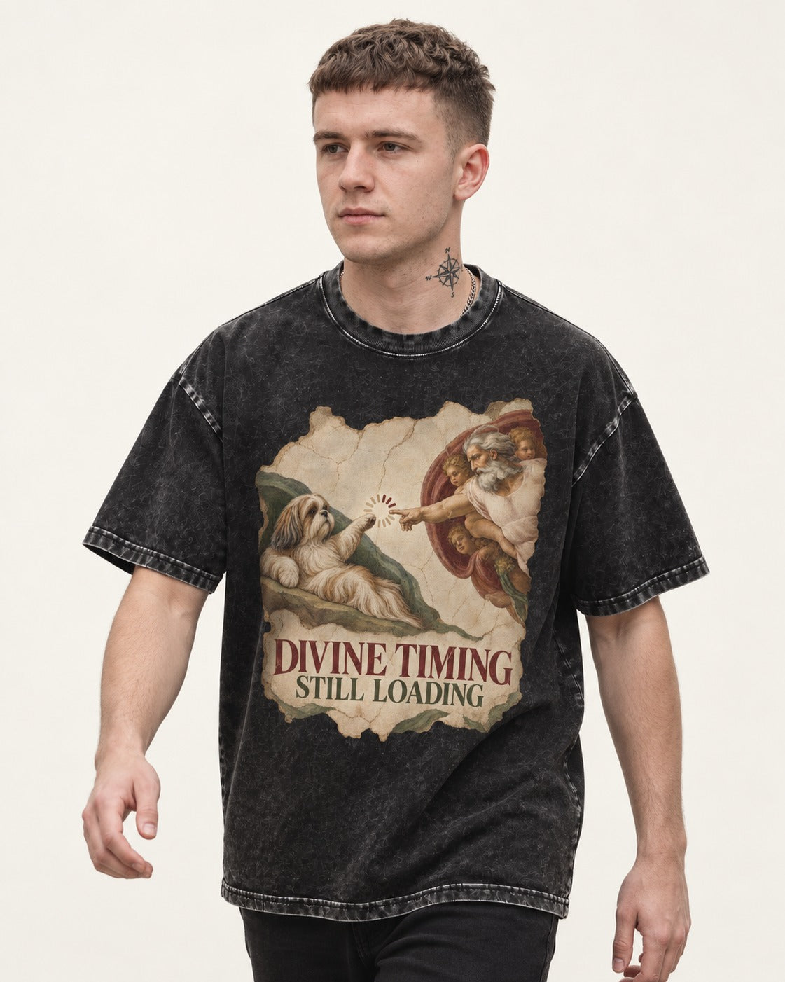 Shih Tzu Divine Timing Still Loading Renaissance Parody Graphic Washed Tee in Black, worn by a model