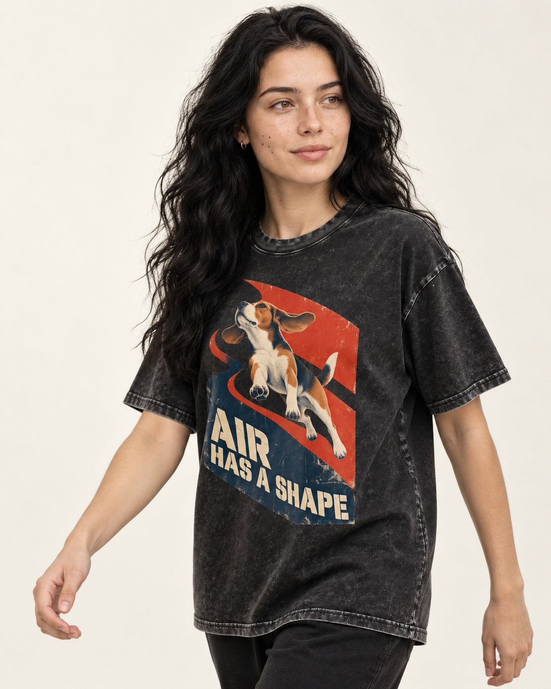 Air Has A Shape Beagle Jumping Graphic Washed Tee in Black, worn by a model
