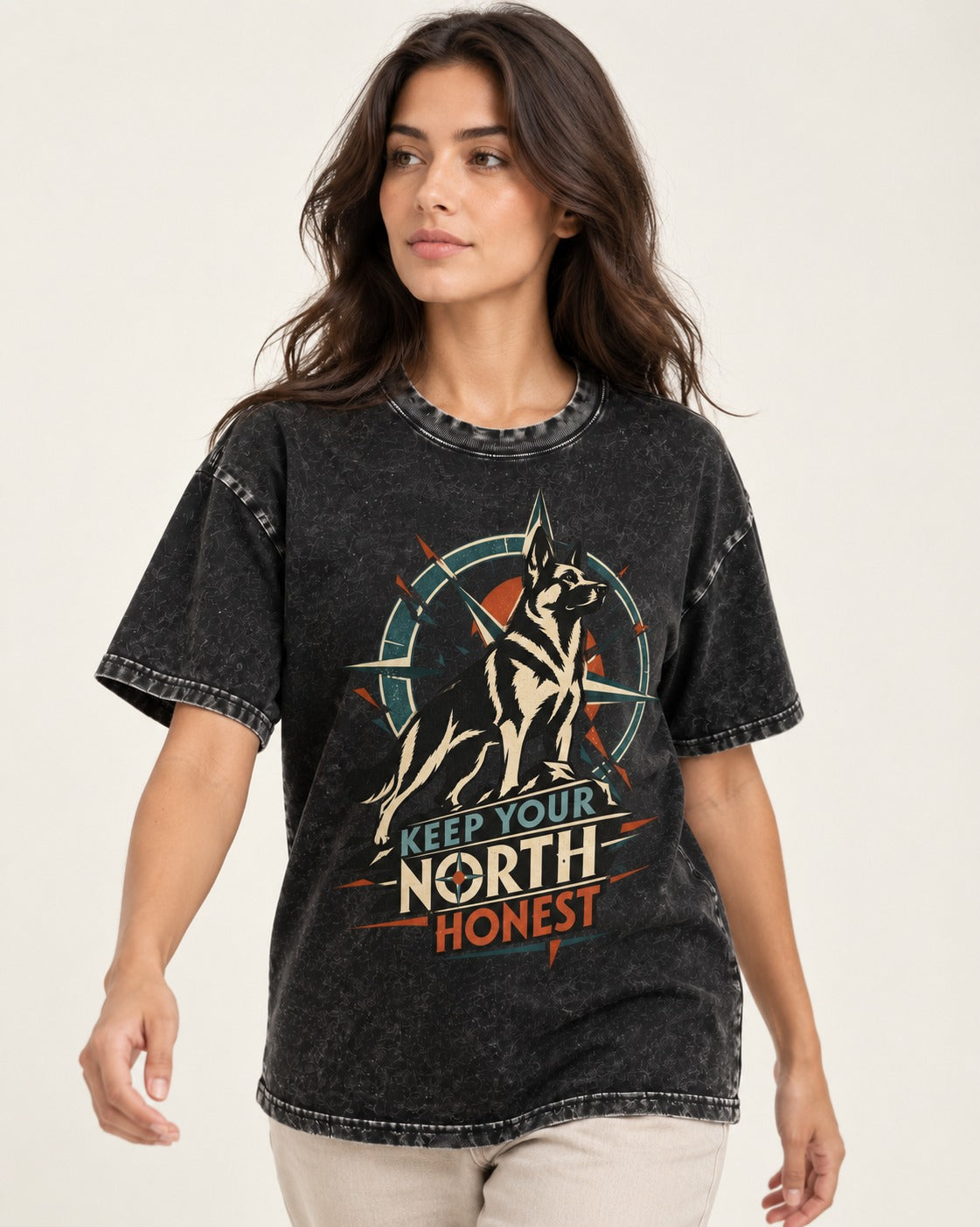 Keep Your North Honest Compass German Shepherd Dog Graphic Washed Tee in Black, worn by a model