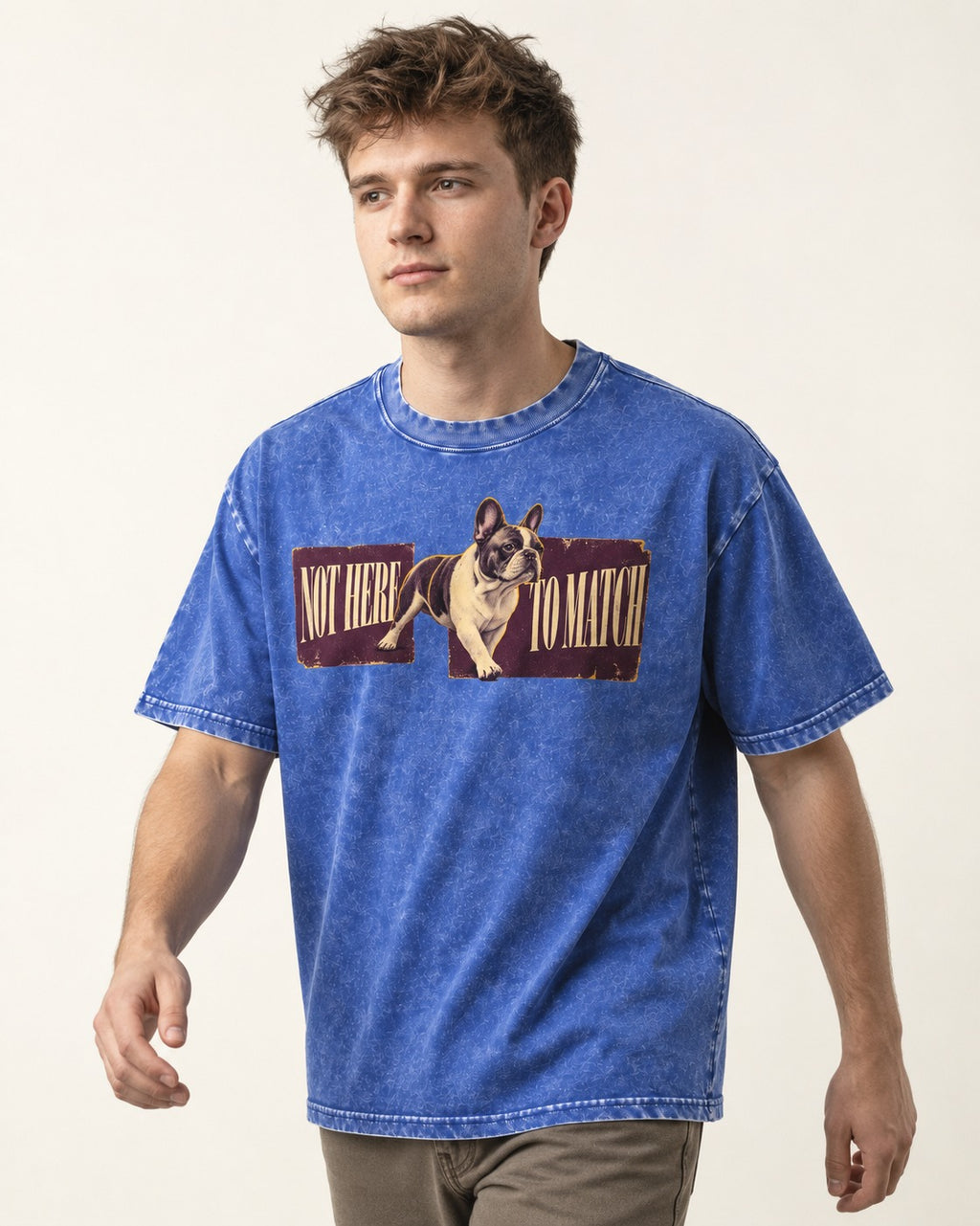 Frenchie Not Here to Watch Panels Graphic Washed Tee in Royal Blue, worn by a model