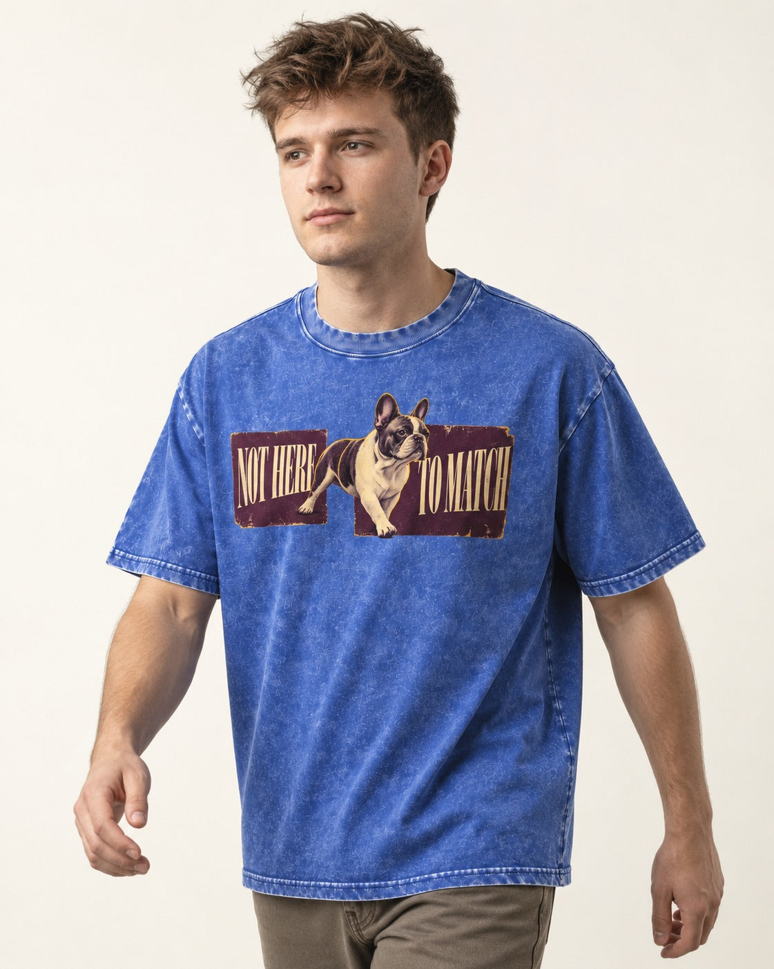 Frenchie Not Here to Watch Panels Graphic Washed Tee in Royal Blue, worn by a model