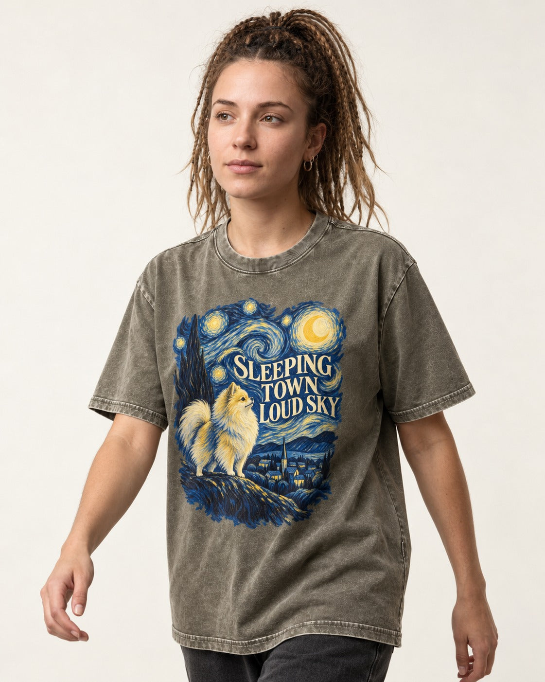 Pomeranian Sleeping Town Loud Sky Starry Night Graphic Washed Tee in Army Green, worn by a model