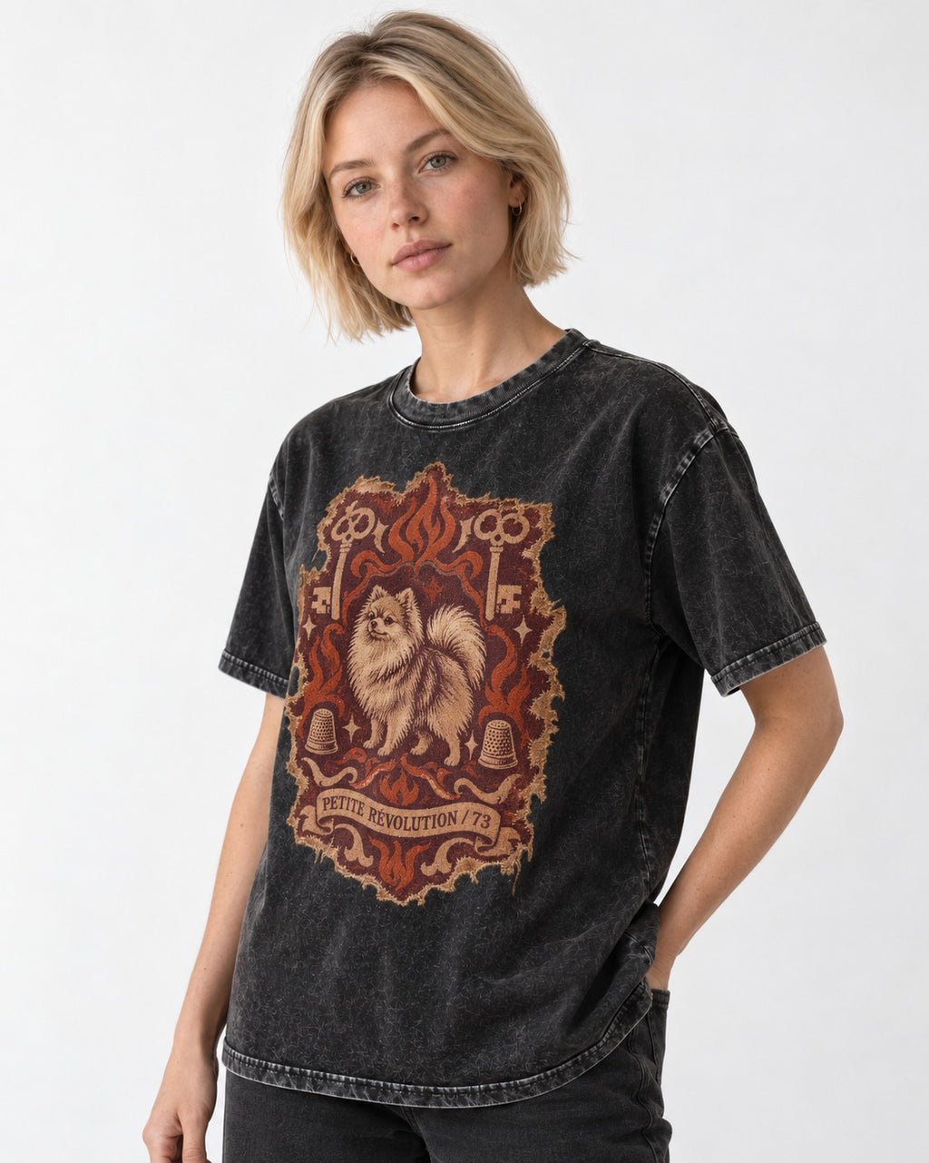 Pomeranian Petite Revolution Ornate Key Emblem Graphic Washed Tee in Black, worn by a model