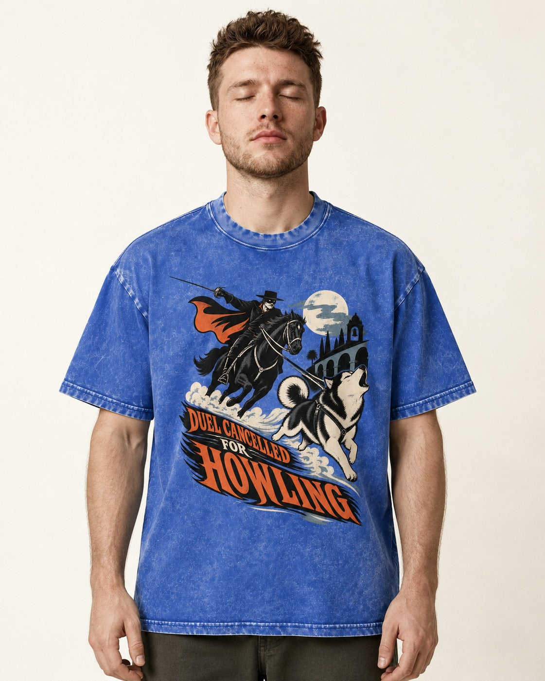 Husky Duel Cancelled for Howling Masked Rider Graphic Washed Tee in Royal Blue, worn by a model