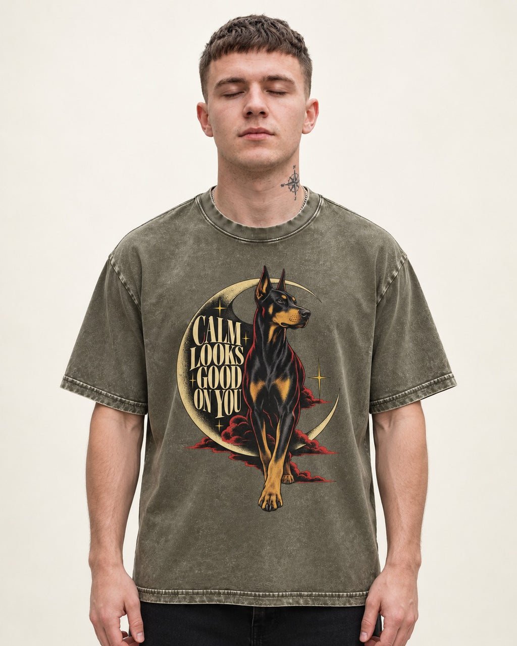 Doberman Calm Looks Good on You Crescent Graphic Washed Tee in Army Green, worn by a model