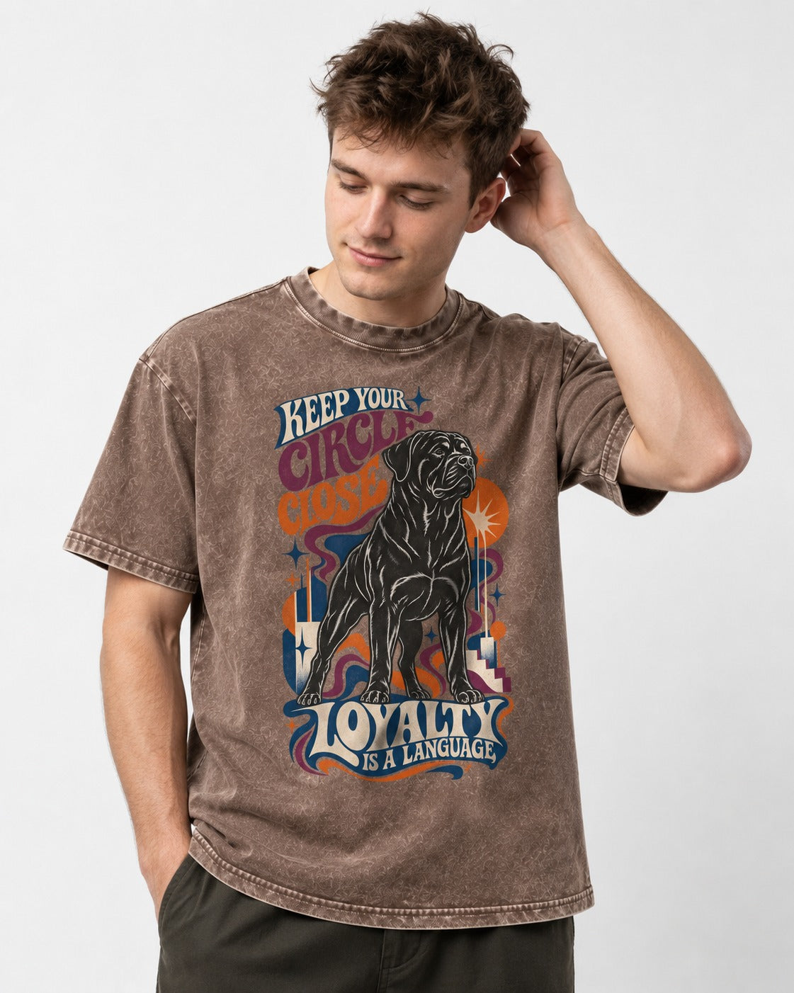 Keep Your Rottweiler Circle Close Washed Tee in Coffee, worn by a model