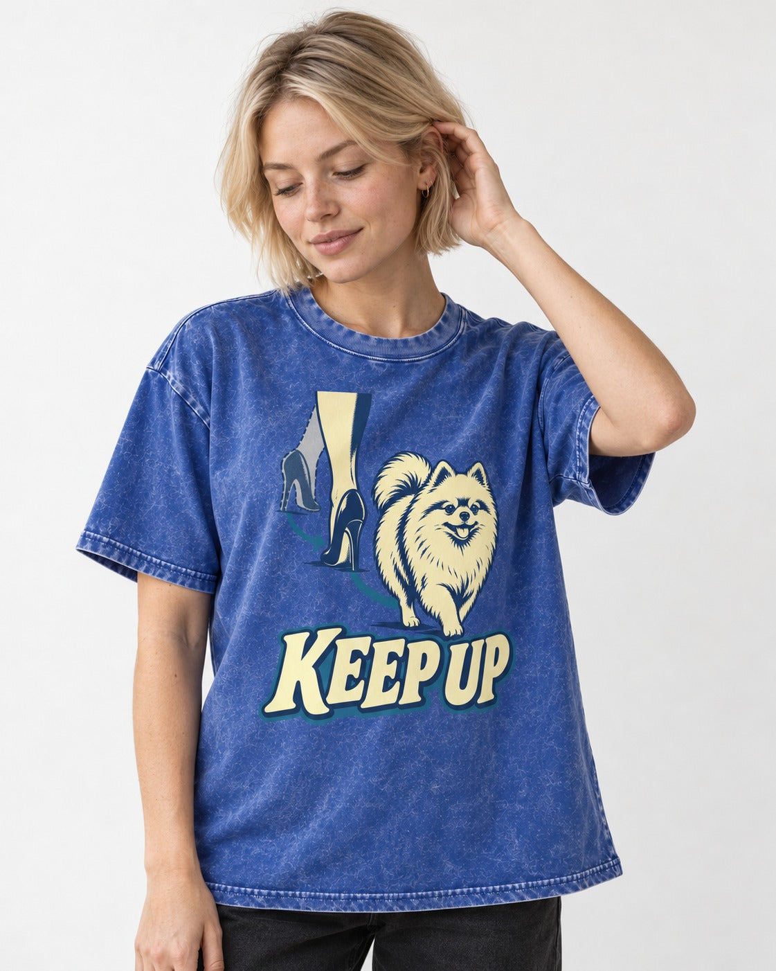 Pomeranian Keep Up High Heel Chase Graphic Washed Tee in Royal Blue, worn by a model