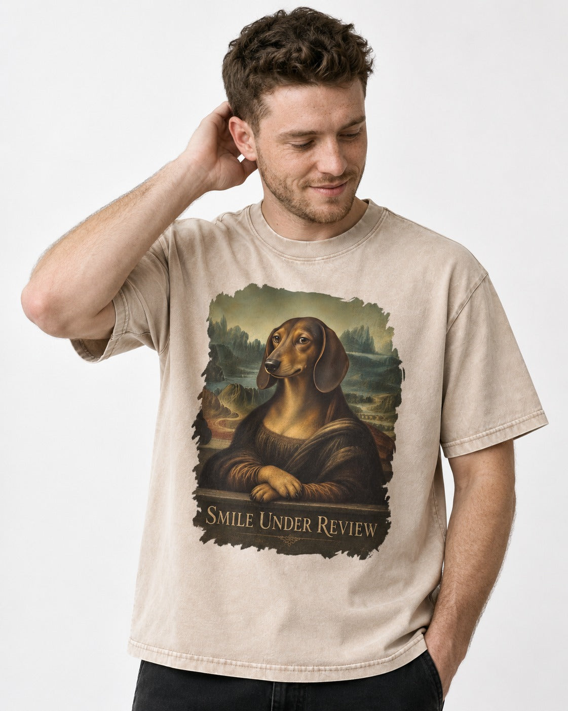 Dachshund Smile Under Review Mona Lisa Graphic Washed Tee in Apricot, worn by a model