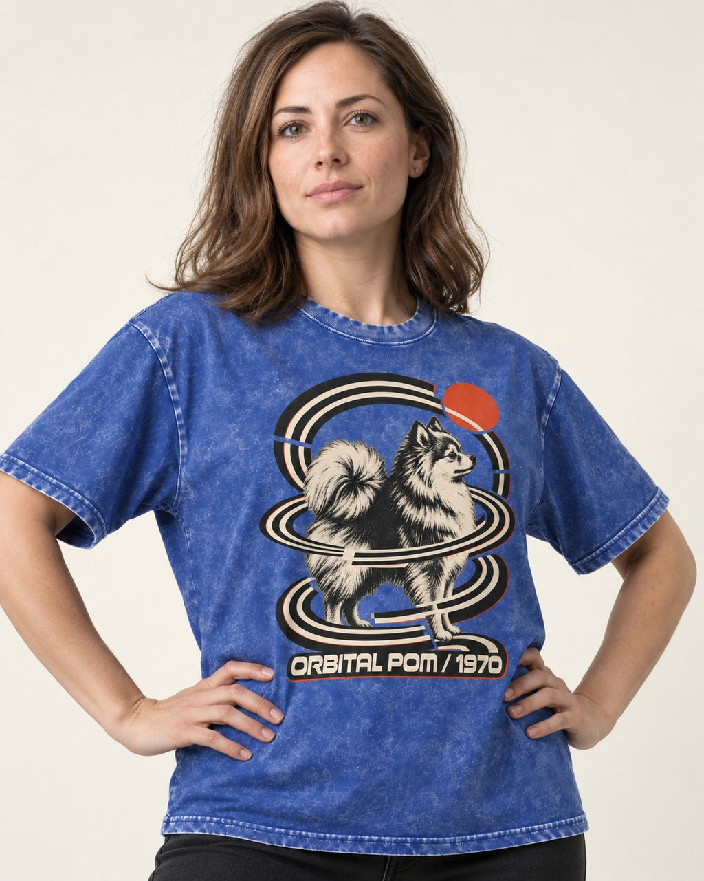 Pomeranian Orbital Pom 1970 Space Age Graphic Washed Tee in Royal Blue, worn by a model