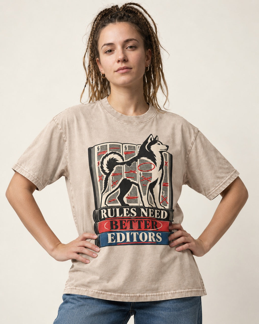 Husky Rules Need Better Editors Book Stack Graphic Washed Tee in Apricot, worn by a model