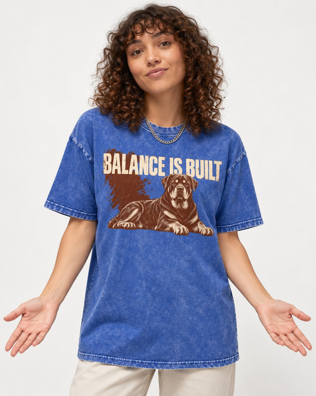 Rottweiler Balance Is Built Resting Strength Graphic Washed Tee in Royal Blue, worn by a model
