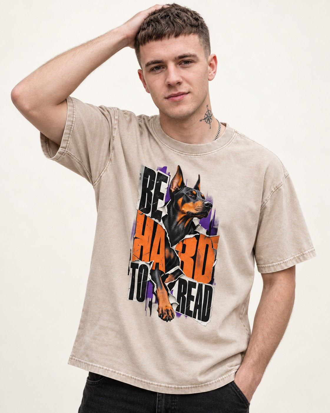 Doberman Be Hard to Read Torn Poster Graphic Washed Tee in Apricot, worn by a model