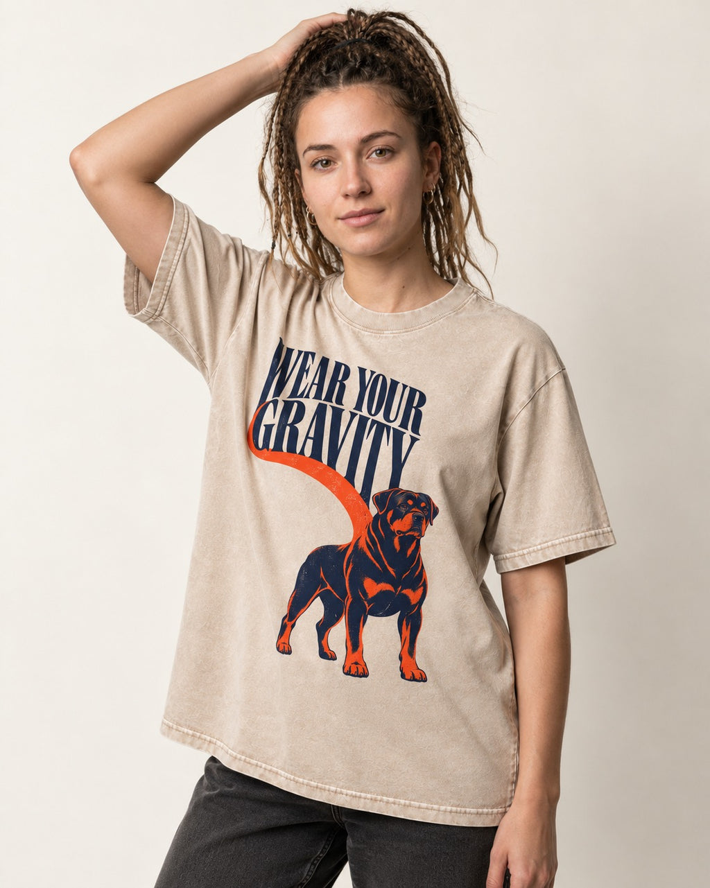 Wear Your Gravity Rottweiler Washed Tee in Apricot, worn by a model