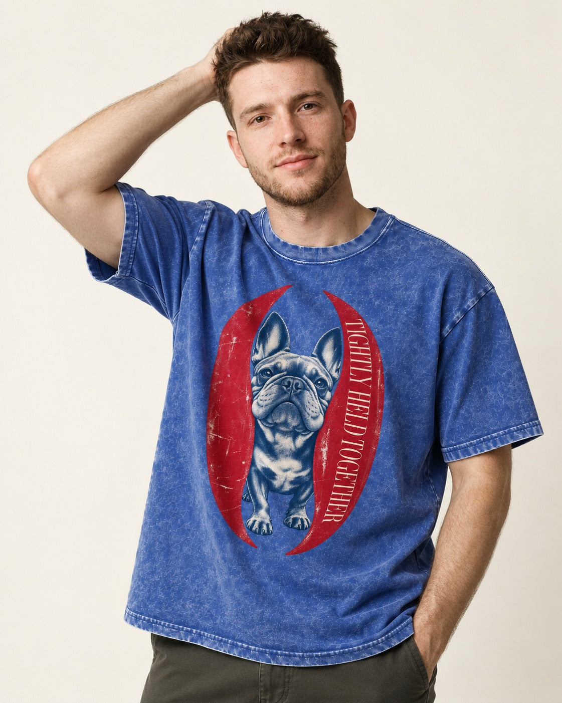 Frenchie Tightly Held Together Red Oval Graphic Washed Tee in Royal Blue, worn by a model