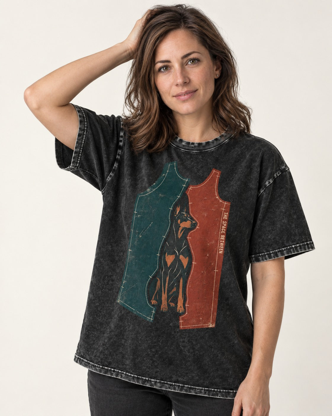 Doberman The Space Between Pattern Pieces Graphic Washed Tee in Black, worn by a model