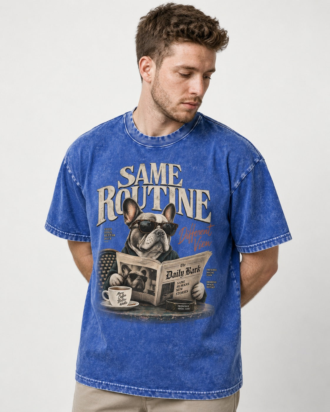 Frenchie Same Routine Different View Graphic Washed Tee in Royal Blue, worn by a model