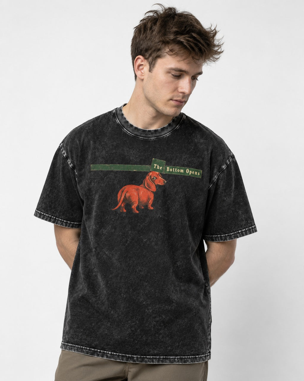 Dachshund The Bottom Opens Signpost Graphic Washed Tee in Black, worn by a model