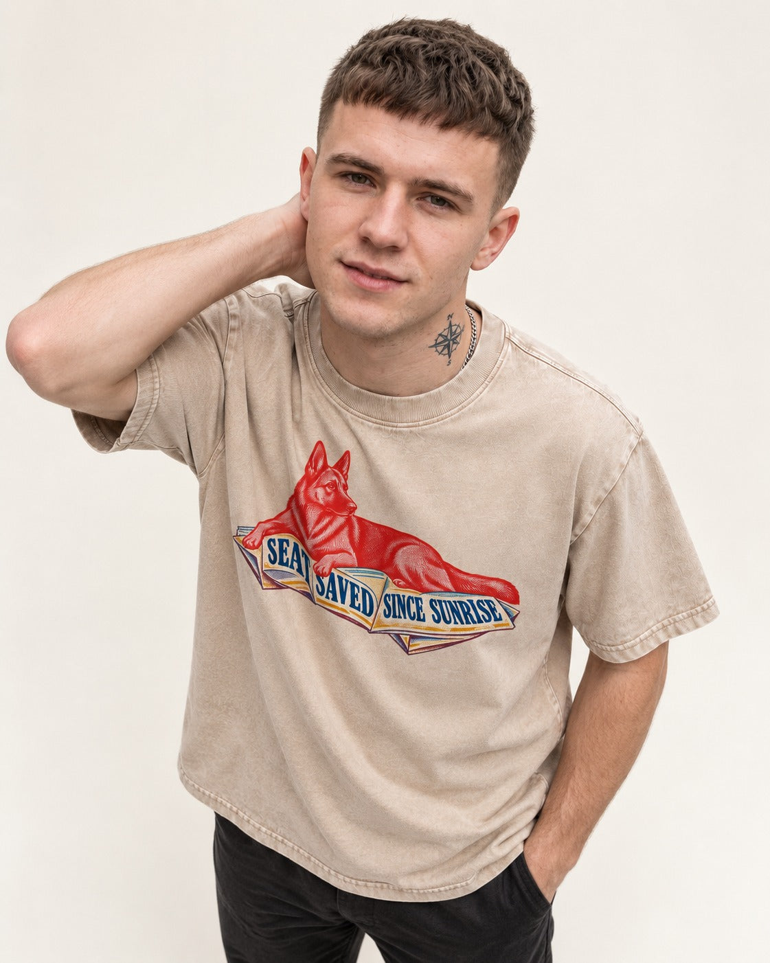 Seat Saved Since Sunrise German Shepherd Dog Washed Tee in Apricot, worn by a model