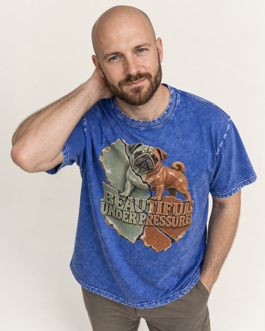 Pug Beautiful Under Pressure Cracked Ceramic Graphic Washed Tee in Royal Blue, worn by a model