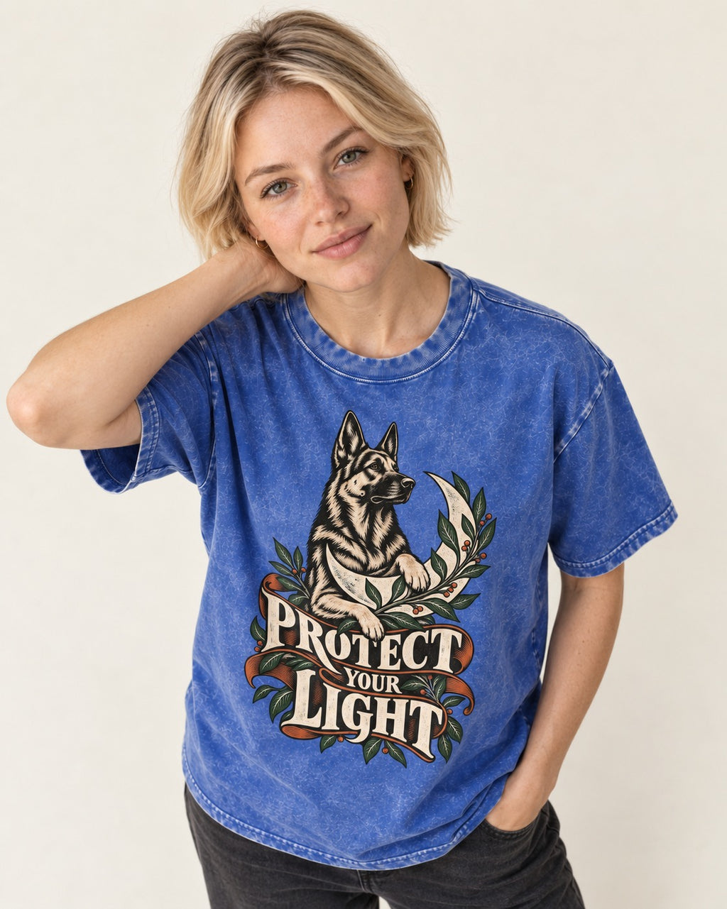 Protect Your Light Moon Botanical German Shepherd Dog Graphic Washed Tee in Royal Blue, worn by a model