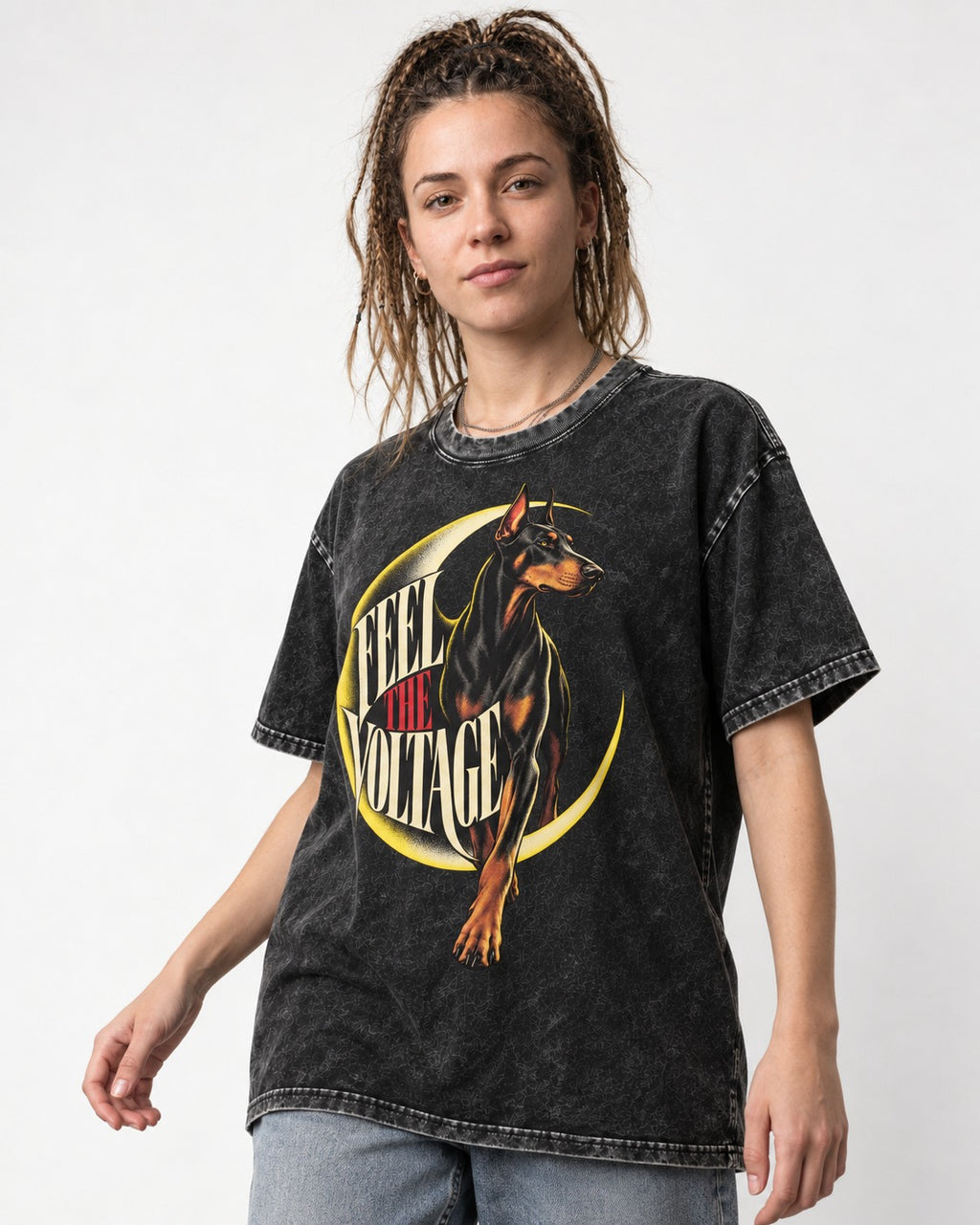 Doberman Feel the Voltage Crescent Portrait Graphic Washed Tee in Black, worn by a model