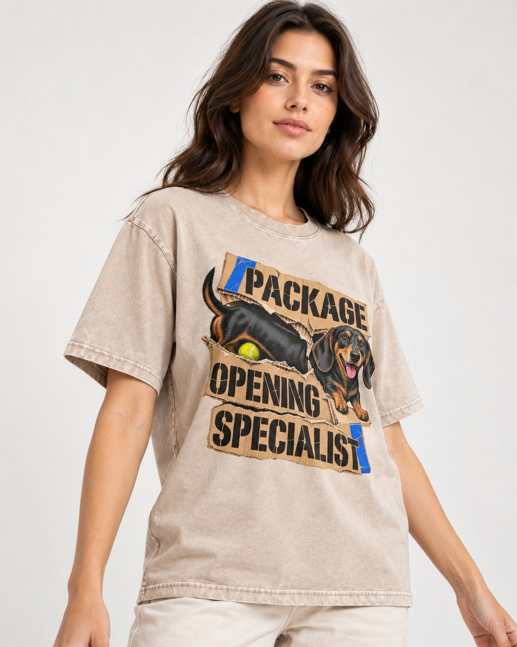 Dachshund Package Opening Specialist Washed Tee in Apricot, worn by a model