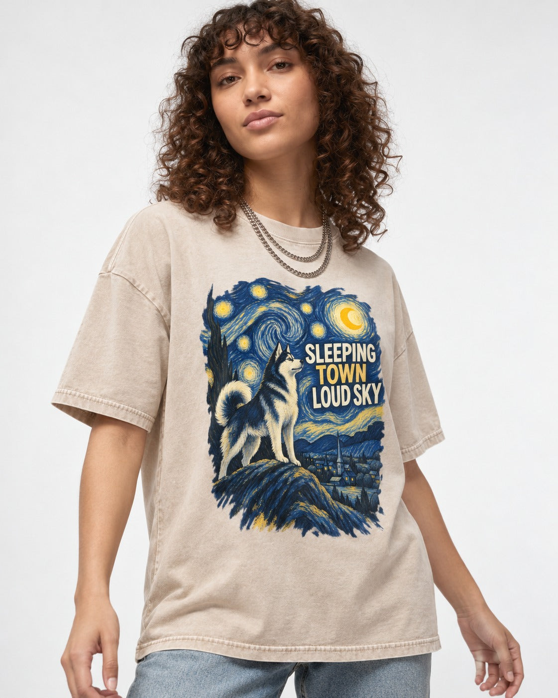 Husky Sleeping Town Loud Sky Starry Night Graphic Washed Tee in Apricot, worn by a model