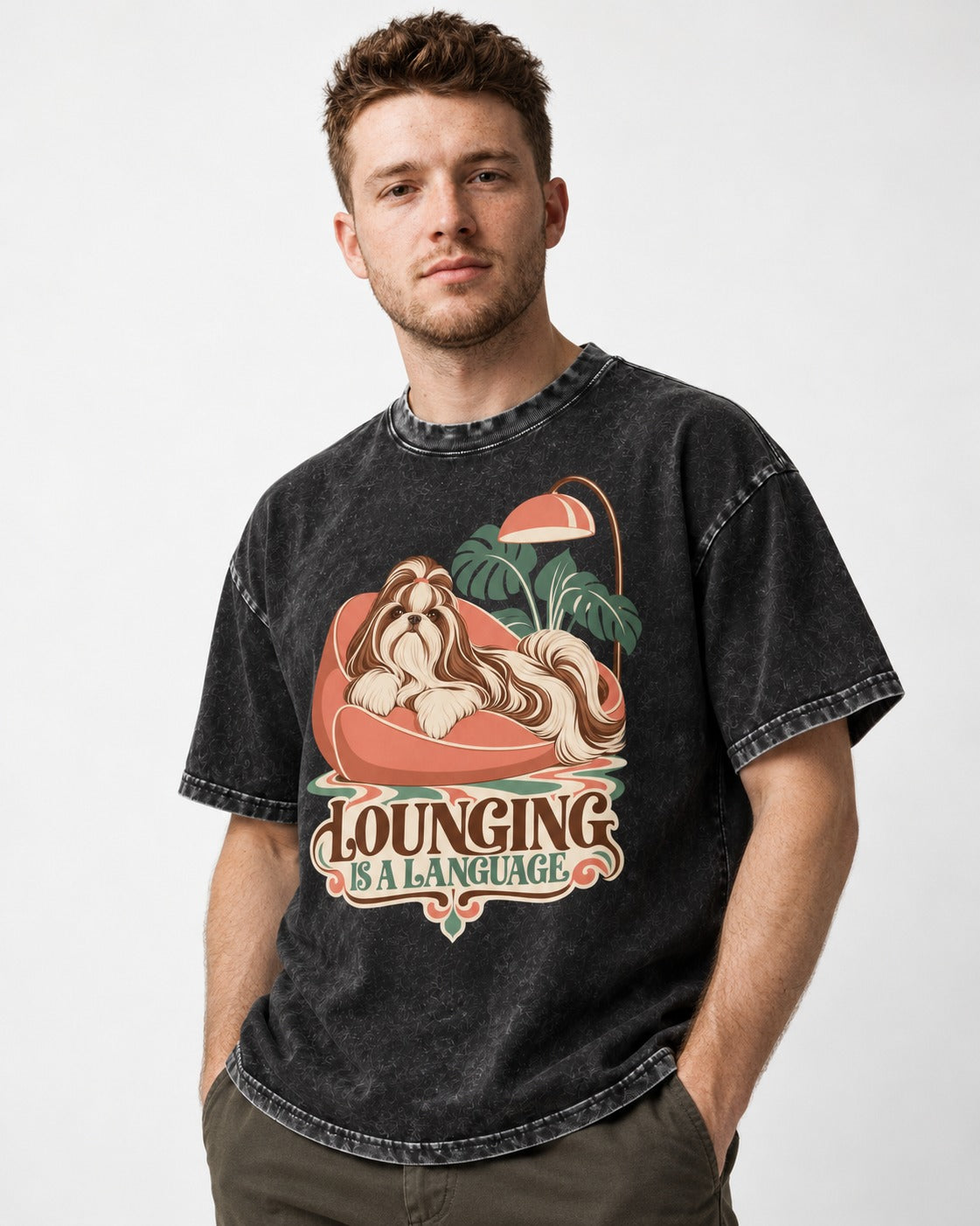 Shih Tzu Lounging Is a Language Retro Lounge Graphic Washed Tee in Black, worn by a model