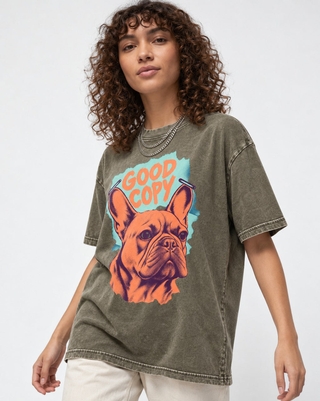 Frenchie Good Copy Stapled Zine Graphic Washed Tee in Army Green, worn by a model