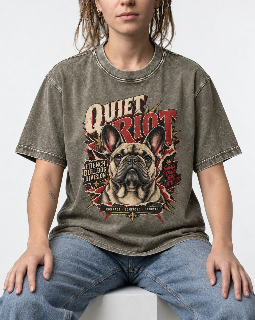 Frenchie Quiet Riot Division Emblem Washed Tee in Army Green, worn by a seated model