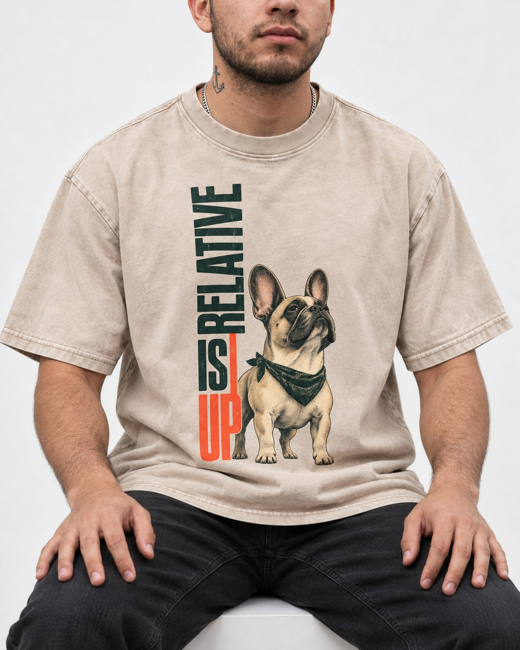 Up Is Relative Frenchie Washed Tee in Apricot, worn by a seated model