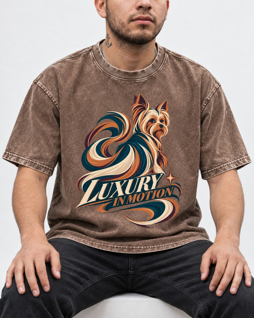 Yorkshire Terrier Luxury in Motion Washed Tee in Coffee, worn by a seated model