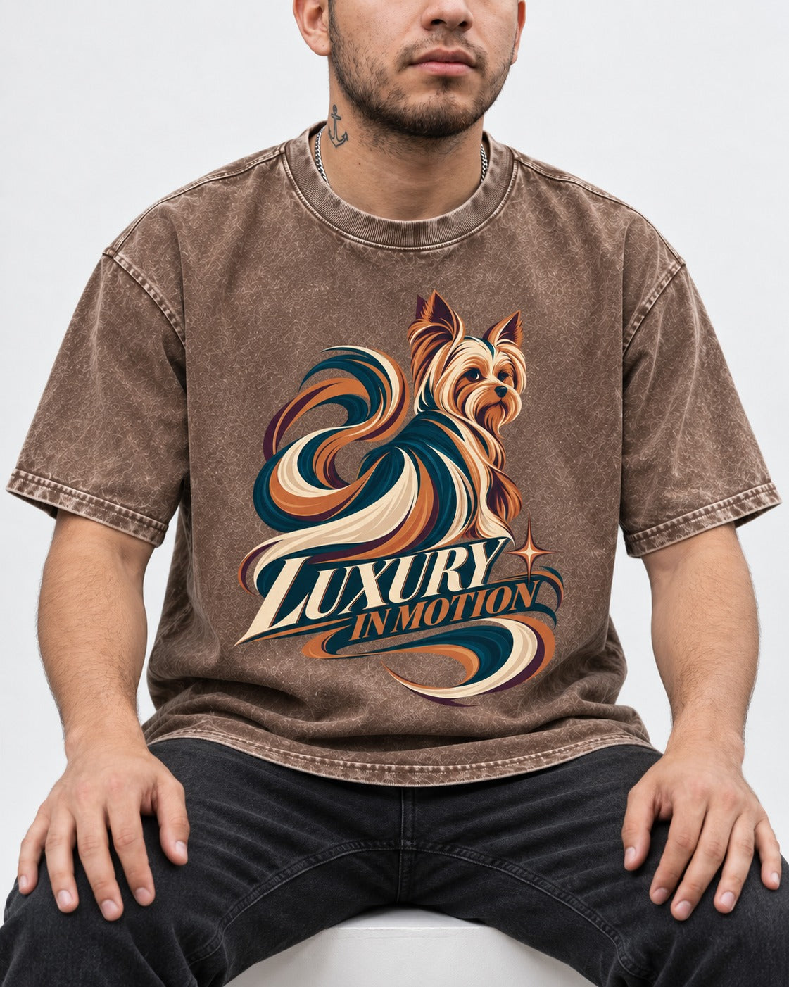 Yorkshire Terrier Luxury in Motion Washed Tee in Coffee, worn by a seated model
