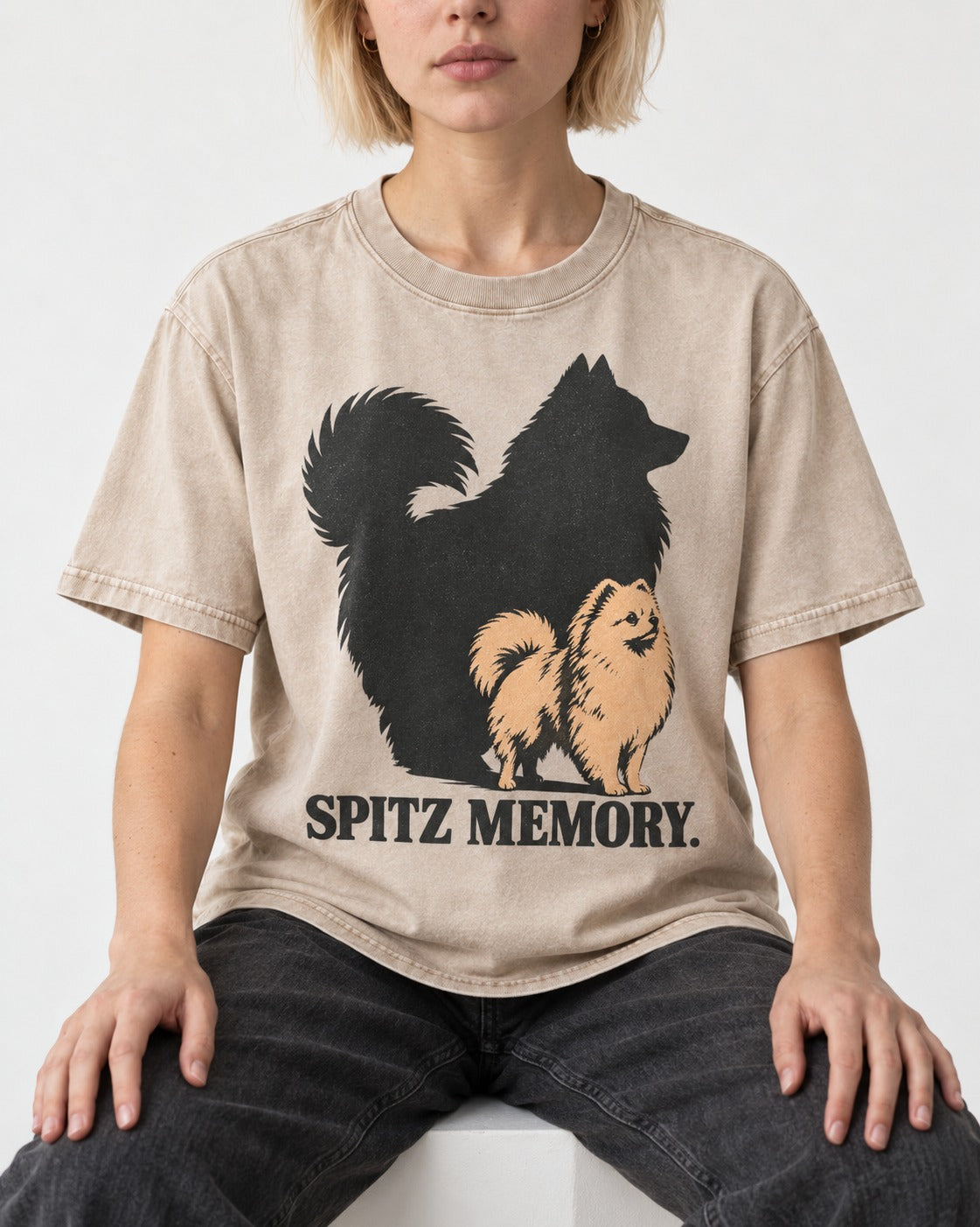Pomeranian Spitz Memory Washed Tee in Apricot, worn by a seated model
