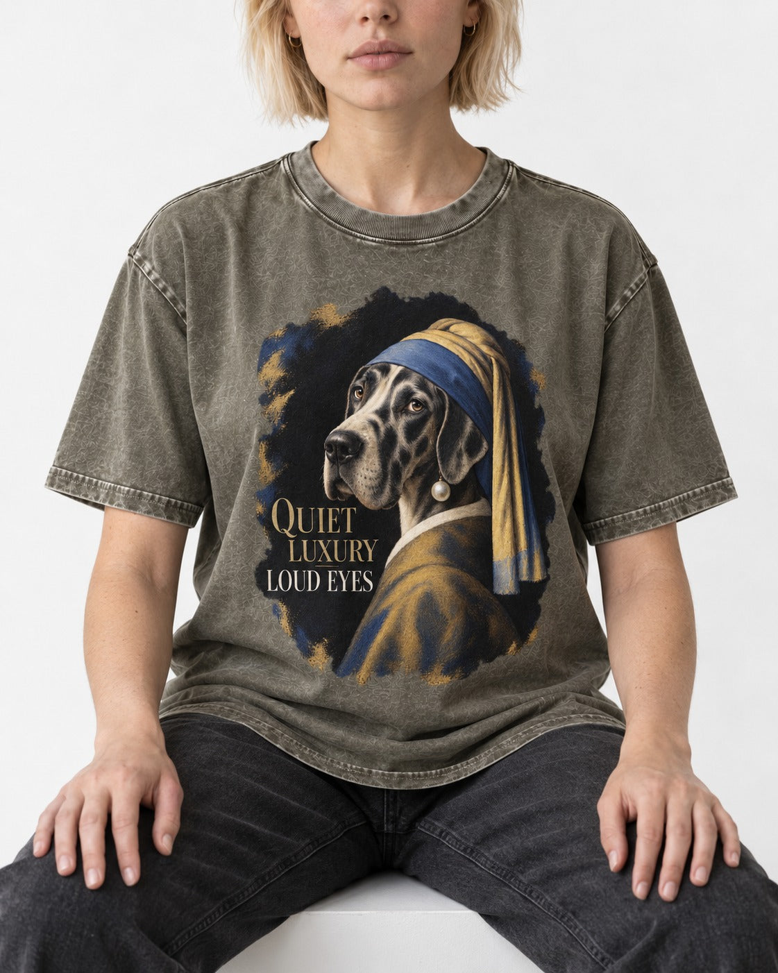 Great Dane Quiet Luxury Loud Eyes Pearl Portrait Graphic Washed Tee in Army Green, worn by a seated model
