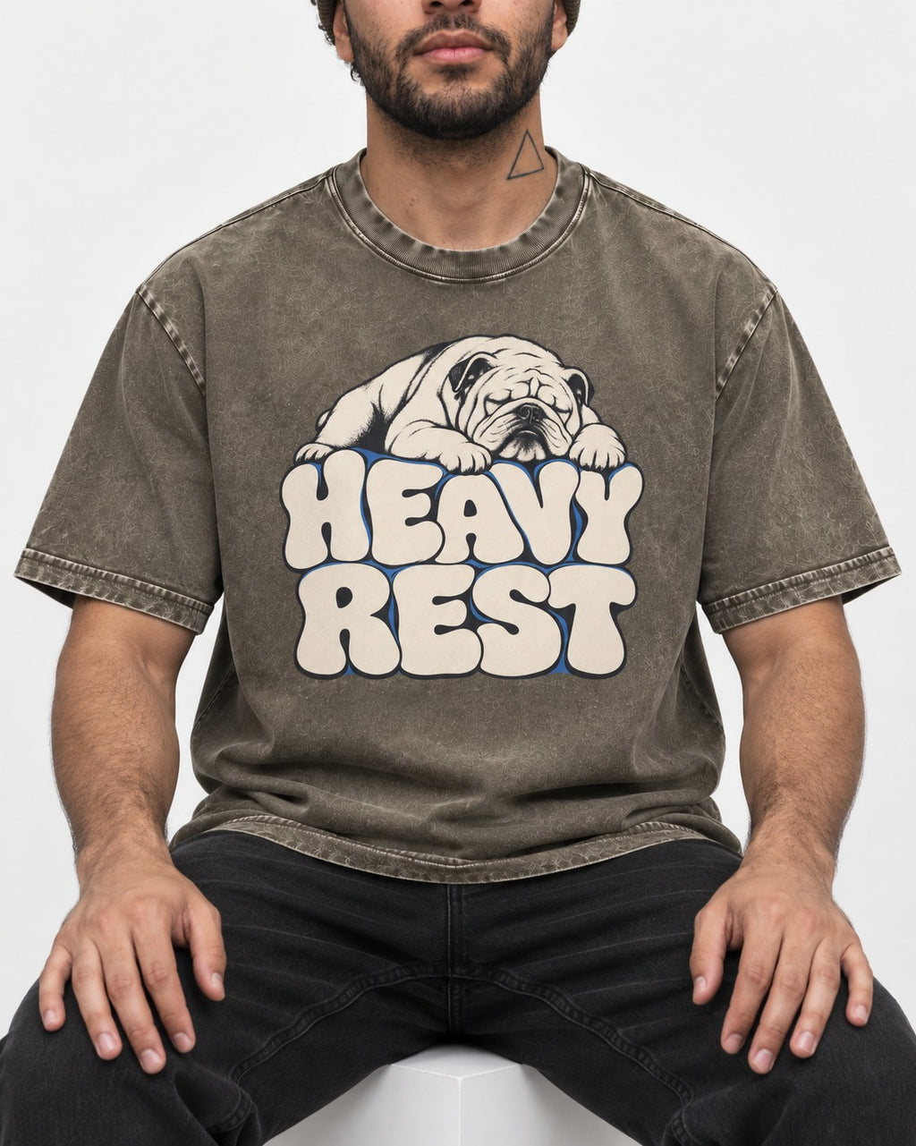 English Bulldog Heavy Rest Graphic Washed Tee in Army Green, worn by a seated model