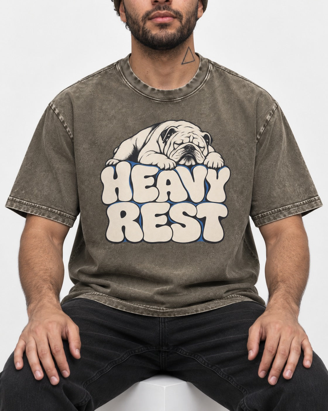 English Bulldog Heavy Rest Graphic Washed Tee in Army Green, worn by a seated model