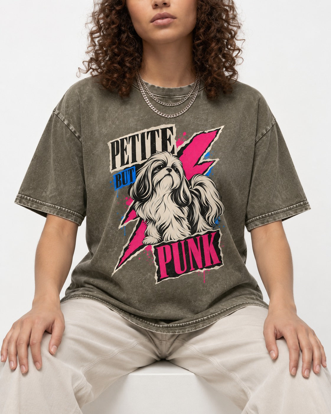 Shih Tzu Petite but Punk Lightning Graphic Washed Tee in Army Green, worn by a seated model