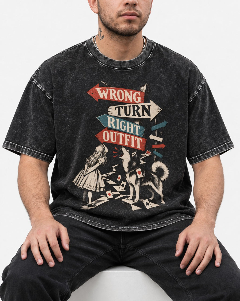 Husky Wrong Turn Right Outfit Wonderland Signpost Graphic Washed Tee in Black, worn by a seated model